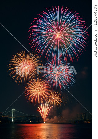 Watch the colorful fireworks from the opposite bank 129344375