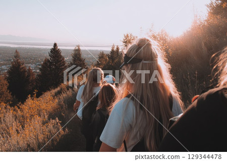 Group hike for mental health awareness, teens descending from hill, Group hike for mental health awareness, teens descending from hill, 129344478