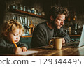father working at the laptop, little child drawing next to him 129344495