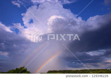 Thunderclouds and rainbows near Utsunomiya City 129346226
