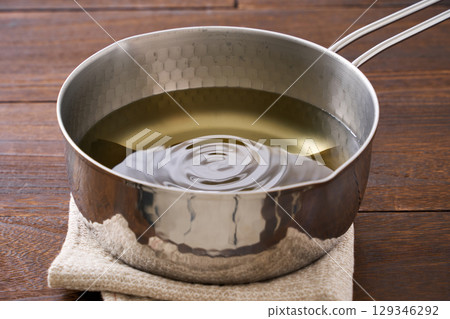 Kelp dashi | Preparation process for dashi, rehydrating kelp in a Yukihira pot Kelp dashi | Preparation process for dashi, rehydrating kelp in a Yukihira pot 129346292