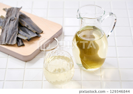 Kombu water | Kombu broth and dried kombu in a glass 129346844