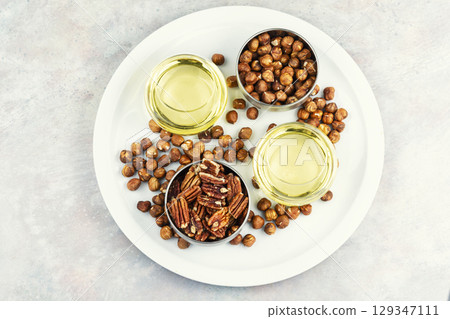 Nut oil and nuts. 129347111