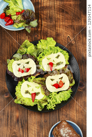 Mini sandwiches with monster faces. Mini sandwiches with monster faces. 129347114
