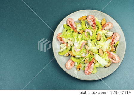 Seafood platter with shrimp, mussels. 129347119