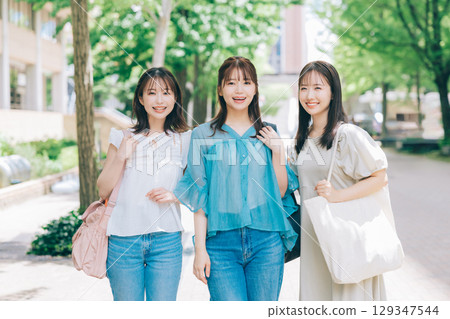 Three female college students Three female college students 129347544