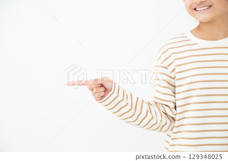 A middle school girl pointing A middle school girl pointing 129348025