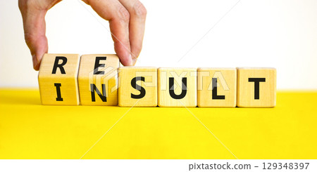 Result or insult symbol. Concept words Result Insult on wooden cubes. Beautiful yellow table white background. Businessman hand. Business and result or insult concept. Copy space. Result or insult symbol. Concept words Result Insult on wooden cubes. Beautiful yellow table white background. Businessman hand. Business and result or insult concept. Copy space. 129348397