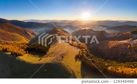 Majestic mountains dyed in autumn leaves Majestic mountains dyed in autumn leaves 129348498