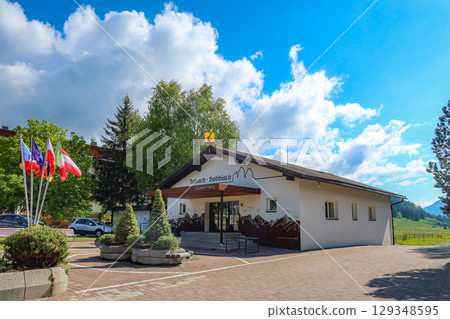 Dobbiaco / Toblach tourist information center on a sunny day in Dobbiaco, BZ, Italy. May 14, 2025 129348595