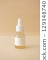 Serum bottle on beige canva background organic natural skincare beauty product mockup 129348740