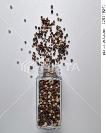 pepper scattered on the table 129349243