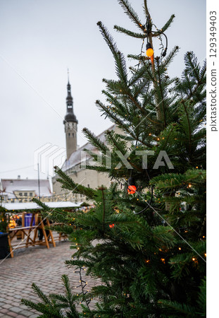 Christmas tree with lights at festive market in Tallinn old town 129349403