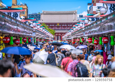 Tokyo cityscape, Japan, August 8th. Extremely hot... Inbound tourism continues... It's like a foreign country... Sensoji Temple is crowded with foreign tourists. Tokyo cityscape, Japan, August 8th. Extremely hot... Inbound tourism continues... It's like a foreign country... Sensoji Temple is crowded with foreign tourists. 129350758