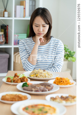 Young woman on a diet Young woman on a diet 129350976