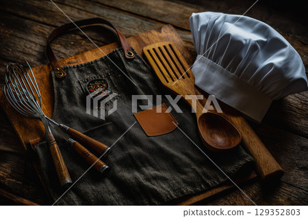 Grill utensils and Father's Day apron display for cooking fun Grill utensils and Father's Day apron display for cooking fun 129352803