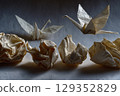 Transformation of crumpled paper into origami crane sequence 129352829