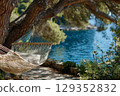 Hammock between pine trees overlooking the Adriatic Sea 129352832