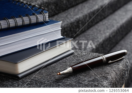 Office supplies staircase depicting onboarding stages 129353064