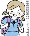 Smiling girl carrying a parcel 129353566