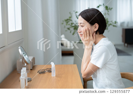 A woman taking UV care A woman taking UV care 129355877