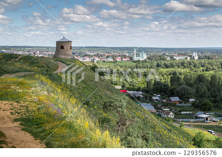 The tower of an ancient Bulgarian fortress on a high cliff on the banks of the Kama River, Elabuga, Tatarstan, Russian Federation The tower of an ancient Bulgarian fortress on a high cliff on the banks of the Kama River, Elabuga, Tatarstan, Russian Federation 129356576