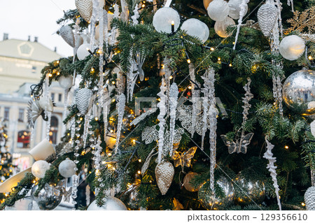 New Year's colorful trees in front of the Central Department Store in Moscow on Kuznetsky Most New Year's colorful trees in front of the Central Department Store in Moscow on Kuznetsky Most 129356610
