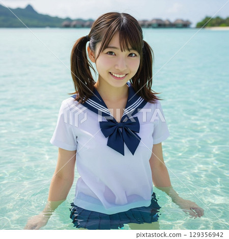 High school girls enjoying the sea 129356942