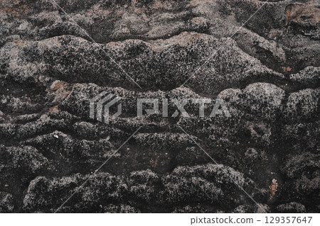 Dark Mud stone background texture, pha taem national park Dark Mud stone background texture, pha taem national park 129357647