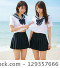 High school girls enjoying the sea 129357666