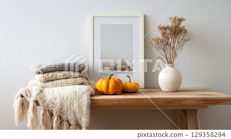 A snug atmosphere adorned with paintings and pumpkins for a festive Halloween touch 129358294