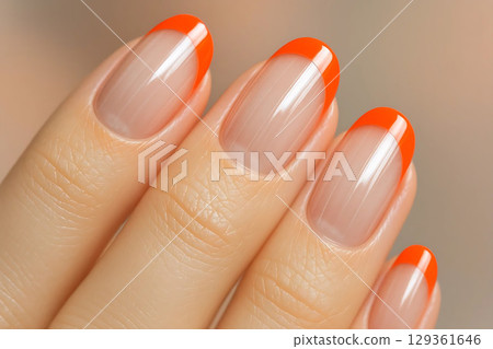 Elegant Womans Hand with Glossy Clear Nails and Vibrant Colored Tips 129361646