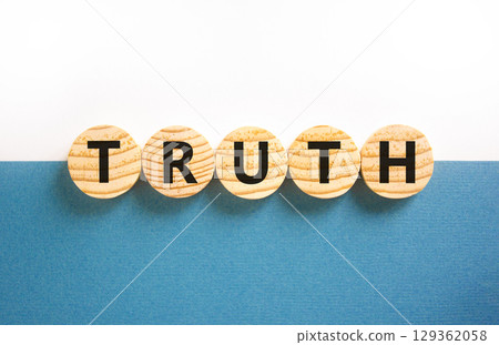 Truth symbol. Concept word Truth on beautiful wooden circles. Beautiful white and blue background. Business lifestyle truth concept. Copy space. Truth symbol. Concept word Truth on beautiful wooden circles. Beautiful white and blue background. Business lifestyle truth concept. Copy space. 129362058