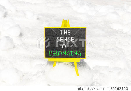 The sense of belonging symbol. Concept words The sense of belonging on beautiful black blackboard. Beautiful snow background. Business and the sense of belonging concept. Copy space. 129362100