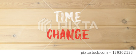 Time change symbol. Concept word Time change on beautiful wooden wall. Beautiful wooden wall background. Business time change concept. Copy space. 129362153