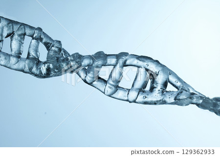 Icicle DNA. DNA Helix. Close-up of a transparent blue DNA helix 129362933