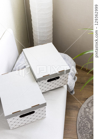 Close up shot of decorative carton box. Household items Close up shot of decorative carton box. Household items 129362999