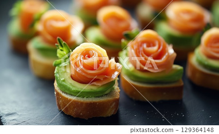 Delicious Salmon And Avocado Rose Topped Toasts On Rustic Rue Bread 129364148