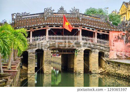 View of the Japanese Bridge in Hoi An. Vietnam, Unesco World Heritage Site. Hoi An is a popular tourist destination of Asia. 129365397
