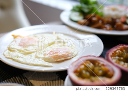 passion fruit Wafer with Fried Egg and Vegetable Sauce, Breakfast passion fruit Wafer with Fried Egg and Vegetable Sauce, Breakfast 129365763