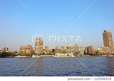 Skyscrapers and cruise ships on the Nile River - Cairo 129366938