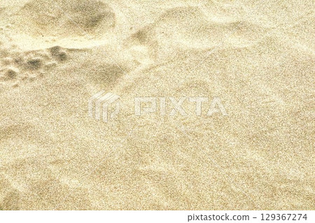 Footprints remaining on the beach Footprints remaining on the beach 129367274