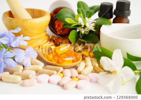 Alternative medicine herbal organic capsule with vitamin E omega 3 fish oil, mineral, drug with herbs leaf natural supplements for healthy good life. Alternative medicine herbal organic capsule with vitamin E omega 3 fish oil, mineral, drug with herbs leaf natural supplements for healthy good life. 129368000