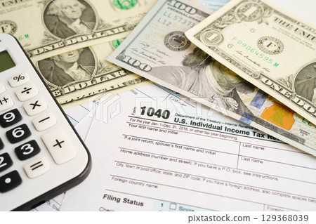 Tax form 1040 U.S. Individual Income Tax Return, business finance concept. 129368039