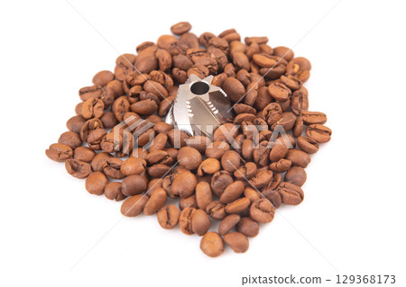 oasted coffee beans, a burr grinder, and ground coffee on a white background oasted coffee beans, a burr grinder, and ground coffee on a white background 129368173