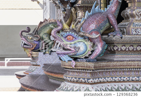 Statues of character that mixes modern anime and cartoons with historical folklore made from plaster decorated exterior the chapel. Statues of character that mixes modern anime and cartoons with historical folklore made from plaster decorated exterior the chapel. 129368236