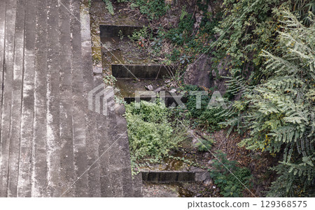 Beautiful view of Walkway along the cliff at Khun Dan Prakan Chon Dam Wall. 129368575