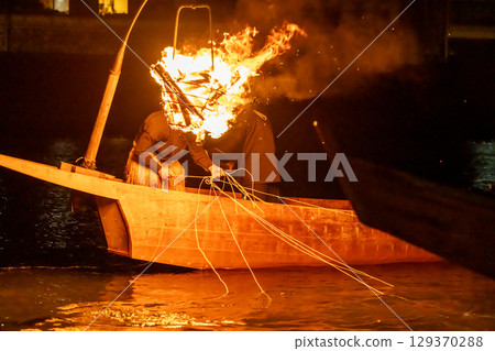 Gifu City, Gifu Prefecture Cormorant fishermen at Nagara River Cormorant Fishing, held on the Nagara River with bonfires lit. Gifu City, Gifu Prefecture Cormorant fishermen at Nagara River Cormorant Fishing, held on the Nagara River with bonfires lit. 129370288