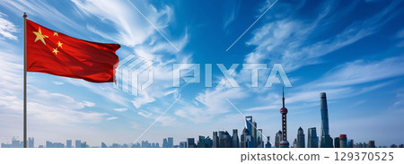 China flag in futuristic city skyline with blue sky. China flag in futuristic city skyline with blue sky. 129370525