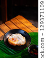 The fried egg Thai style for  food concept. 129371109